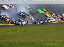 Michael Waltrip and David Reutimann spin which brings out the fourth caution of the Daytona 500. The incident involved 14 cars on lap 30 at Daytona International Speedway in Daytona Beach, Fla. Credit: John Harrelson/Getty Images for NASCAR